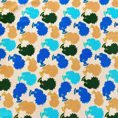 This fabric is a canvas of artistic expression, where whimsical design meets vibrant coloration. The creamy base serves as the backdrop to a playful dance of Afro silhouettes adorned in azure and golden brown. Each Afro silhouette creates a rhythmic pattern that is both lively and enchanting. The blue Afros are like sapphires amidst fields of gold, showcasing an attention to detail that elevates the fabric to a narrative tapestry. 🎨